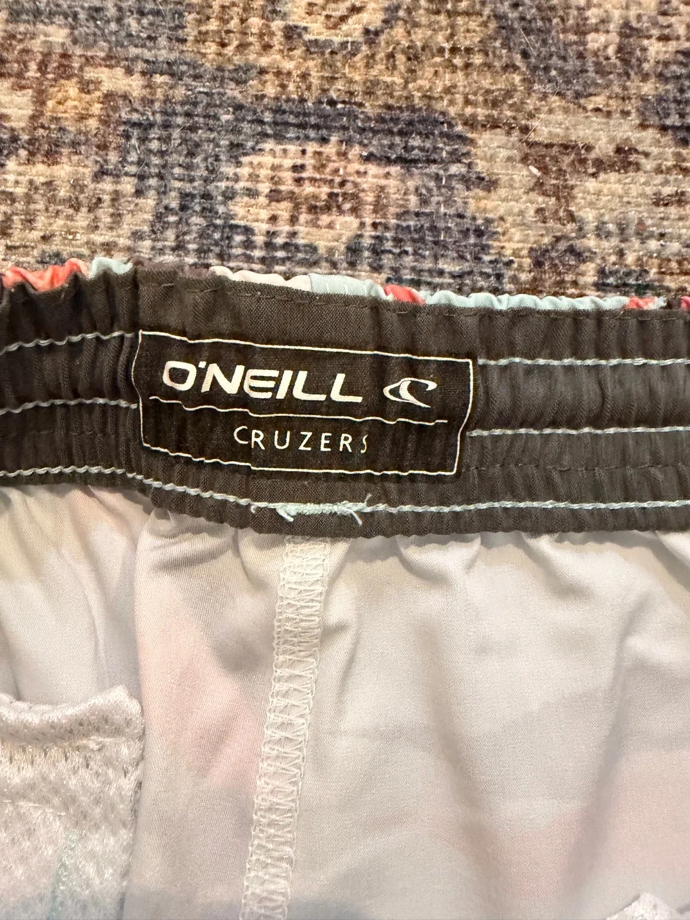 O'Neill Mint Blue Tropical Print Swim Shorts with Coral and Black Accents